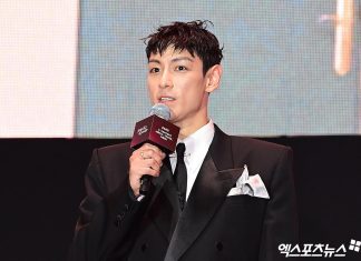 Can T.O.P, Supported by G-Dragon and Taeyang, Win Back Public Favor with Star-Studded Collaborations?